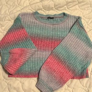 Rainbow colored half sweater.